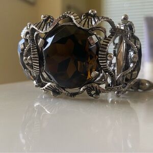 Elegant Silver tone and Smokey Brown
Glass Decorative Bracelet